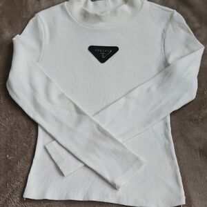 BEAUTIFUL AND FASHION White Turtleneck Top with Logo. OFF WHITE COLOR